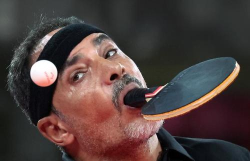 پینگ پنگ با دهان در مسابقات پارالمپیک توکیو/عکس