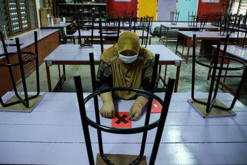 بازگشایی مدارس مالزی در دوران کرونا/ عکس